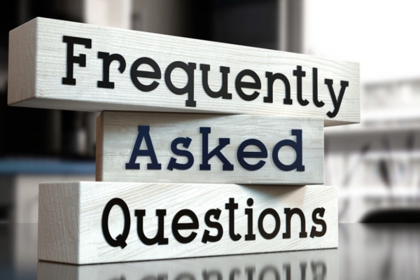 frequently asked questions written on wooden bars depicting FAQs about smart oil tank gauge