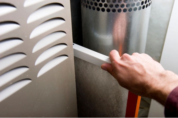 image of a furnace filter replacement