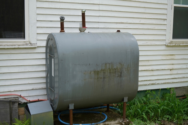 residential heating oil tank depicting fuel additives