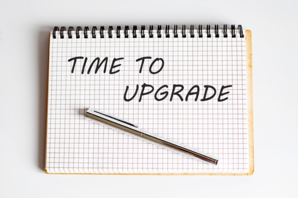 time to upgrade written on a notebook depicting boiler replacement